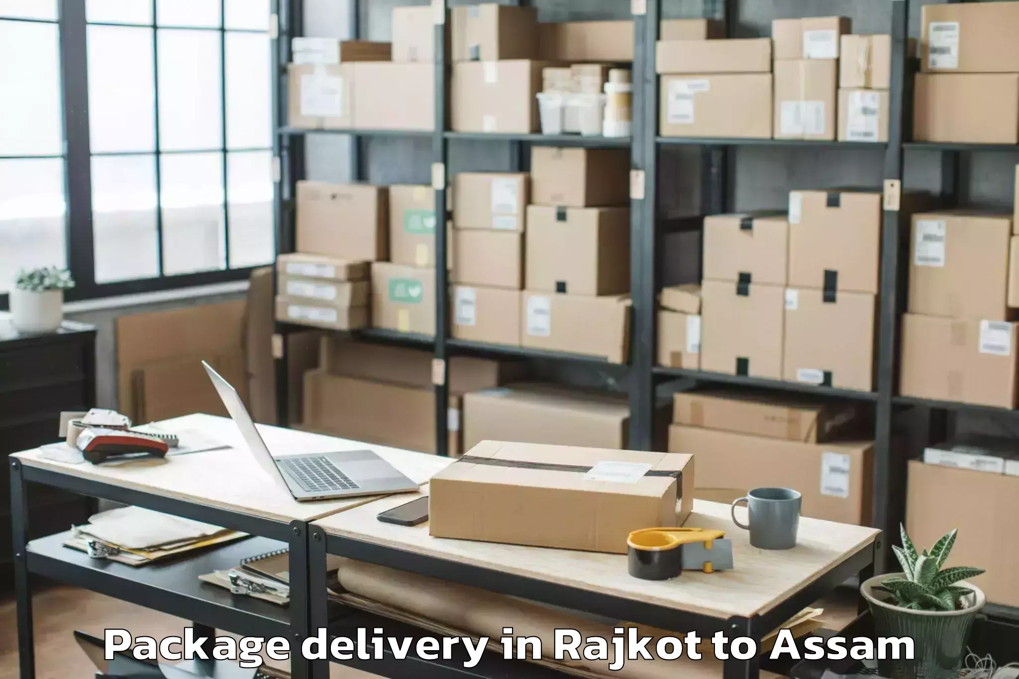 Easy Rajkot to Khoirabari Pt Package Delivery Booking